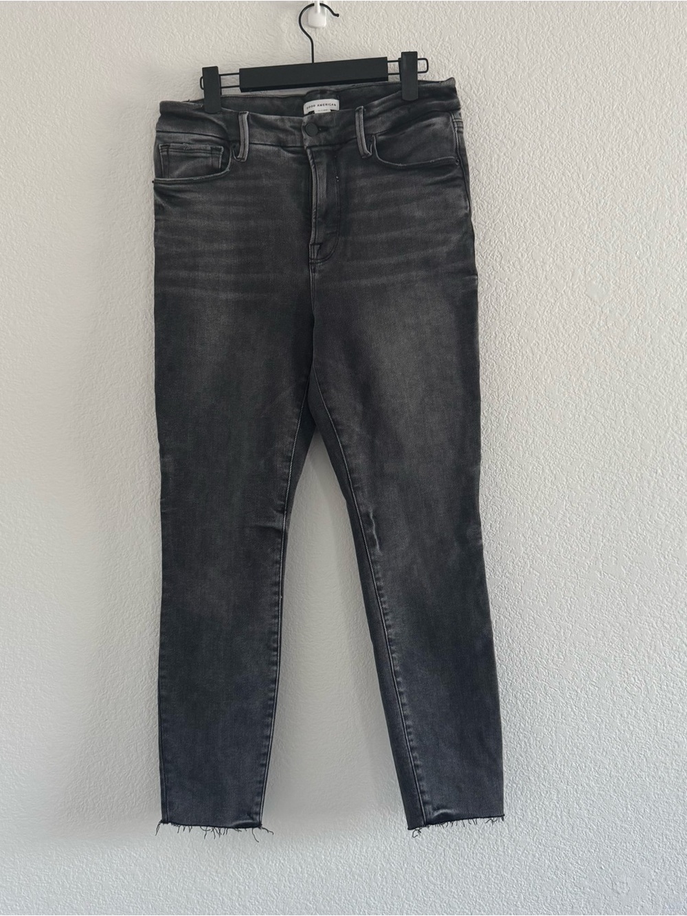 Good American Faded Black Skinny Jeans with Frayed Hem